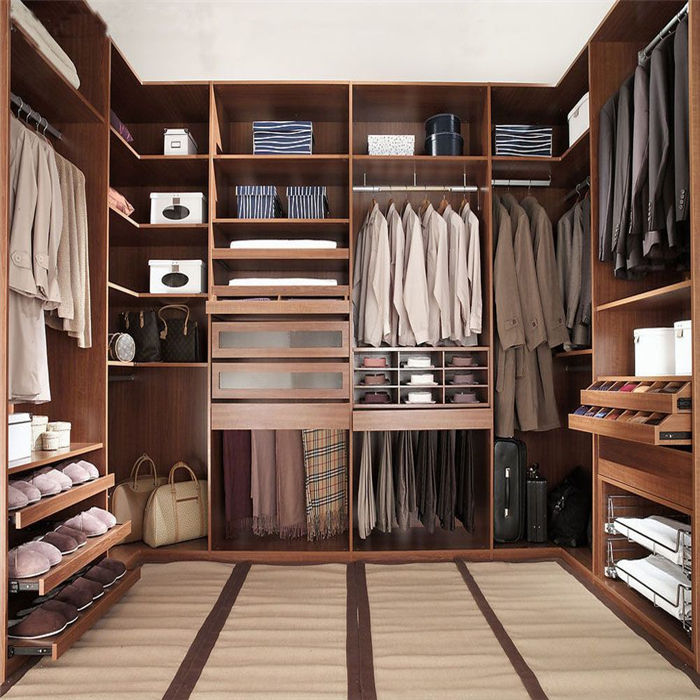 walk in wardrobe with open shelves hanging space and organized storage